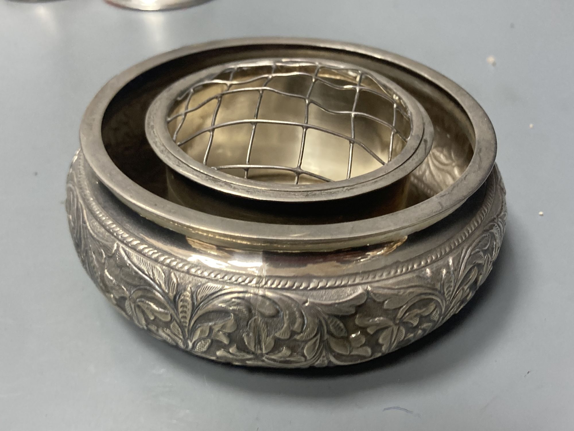 Two silver trumpet vases, one a.f., a Birks sterling compact and four continental white metal items,